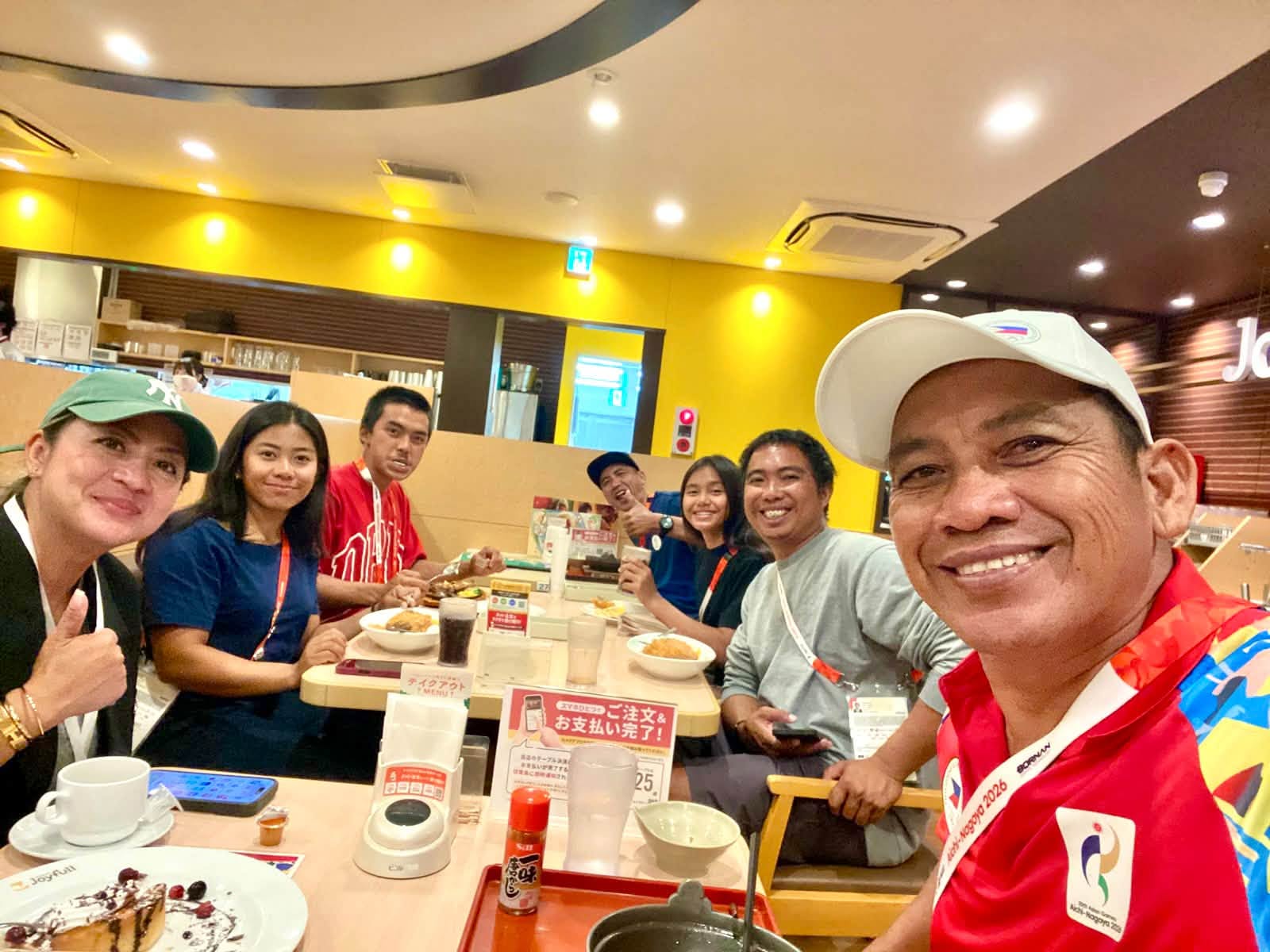 GG with travelers at a restaurant in Japan